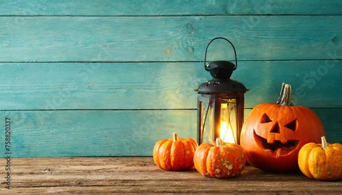 halloween wooden background with pumpkins and lanterns