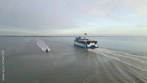 Aerial view of passenger and vehicle ferry at open sea, Harlingen, Netherlands photo