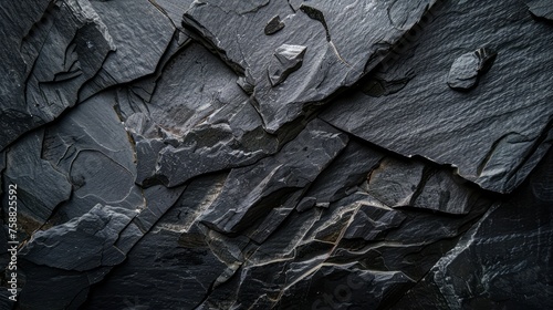Black slate texture. Dark gray stone background. photo