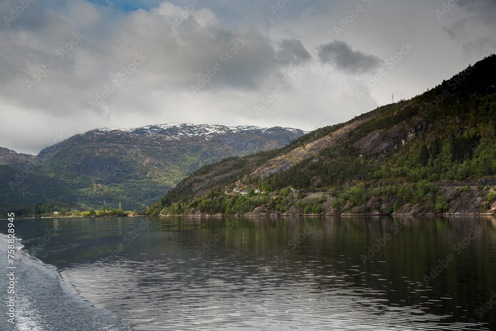snow on the mountains in fjords