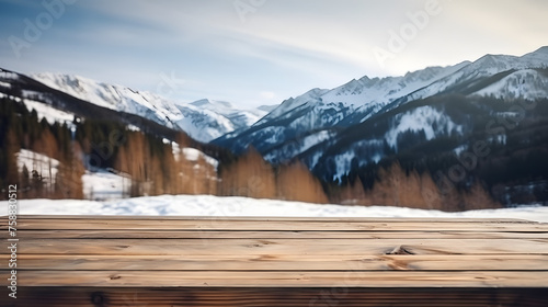 Empty wooden table in front of snow landscape background © Oleksandr