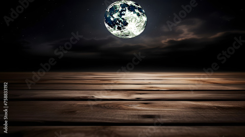 Empty wooden table in front very close up of night background with moon