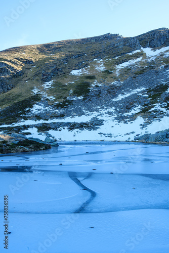 Pozo Ferreira, lagoon in the glacial cirque of Cuiña peak, Sierra de Ancares, León photo