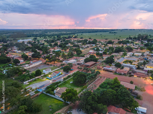 Aerial landscape of rainforest and village during summer sunset in Nobres Bom Jardim Mato Grosso