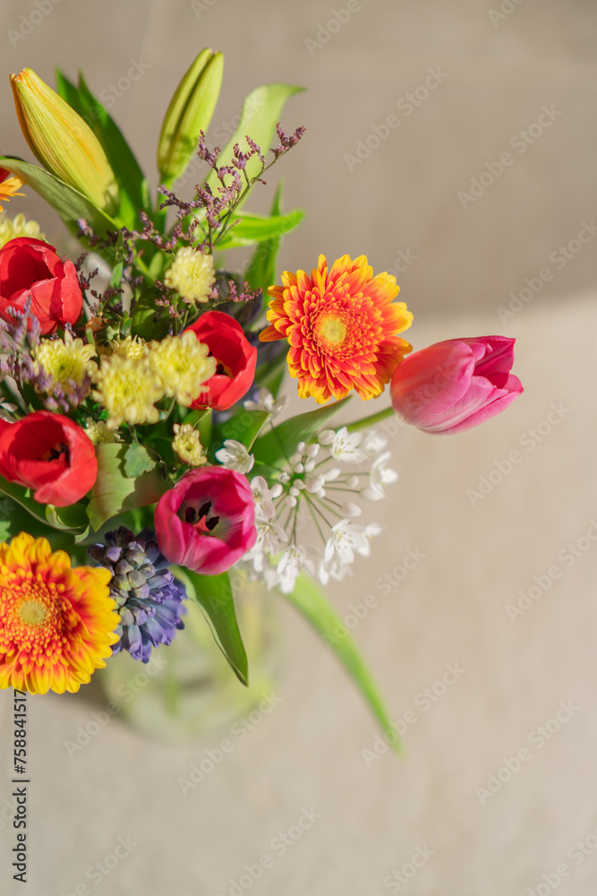 Radiant bouquet embodying the vibrancy of nature with the spring tulips, the sunny appeal of gerberas and the delicate charm of hyacinths