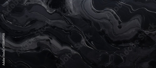 Black marbling texture featuring abundant contrasting veins for versatile use in design. photo
