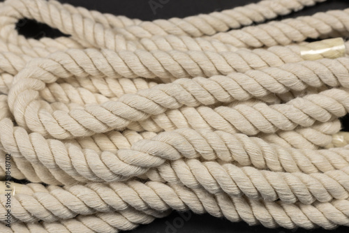 Rope detail on dark. Close-up of its rope texture Depth of field minimalism ropes