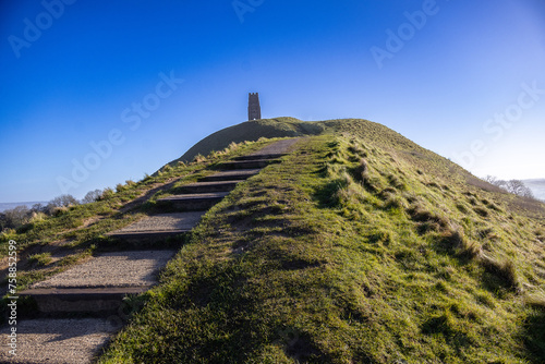 Drone Captures Breathtaking Sunrise with Mist at Glastonbury Tor - A Spectacular View from Somerset's Iconic Landmark