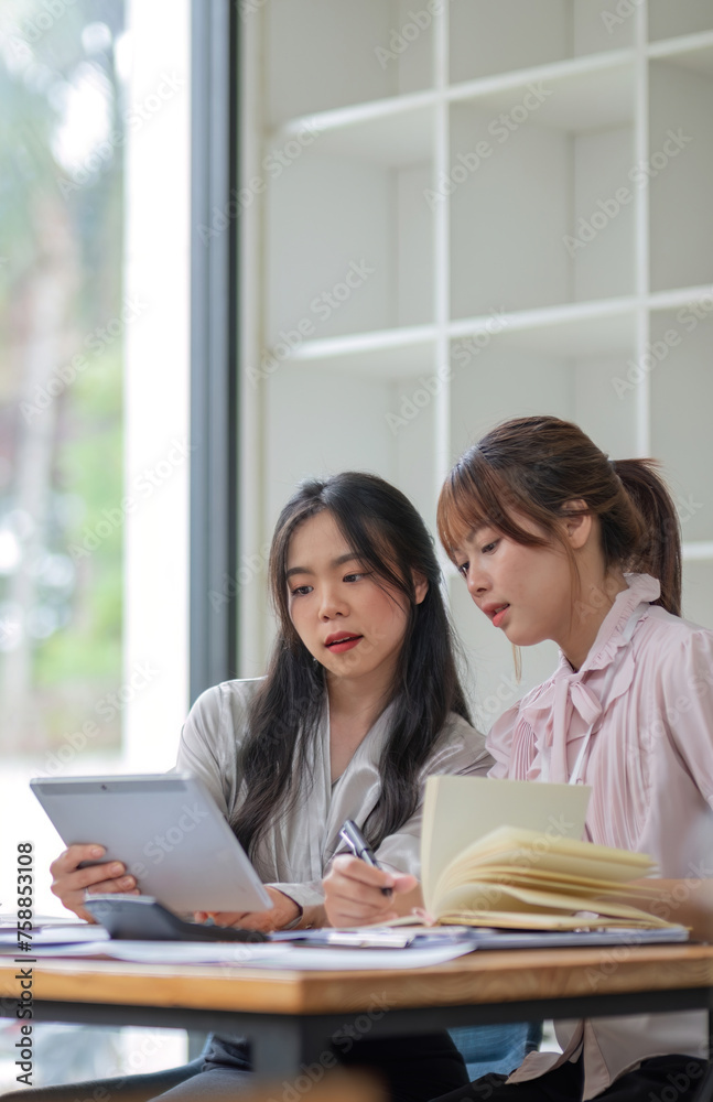 Two business people talk project strategy at office Businessman discuss project planning with colleague at modern workplace while having conversation and advice on financial data report Two business people talk project strategy at office Businessman discuss project planning with colleague at modern workplace while having conversation and advice on financial data report