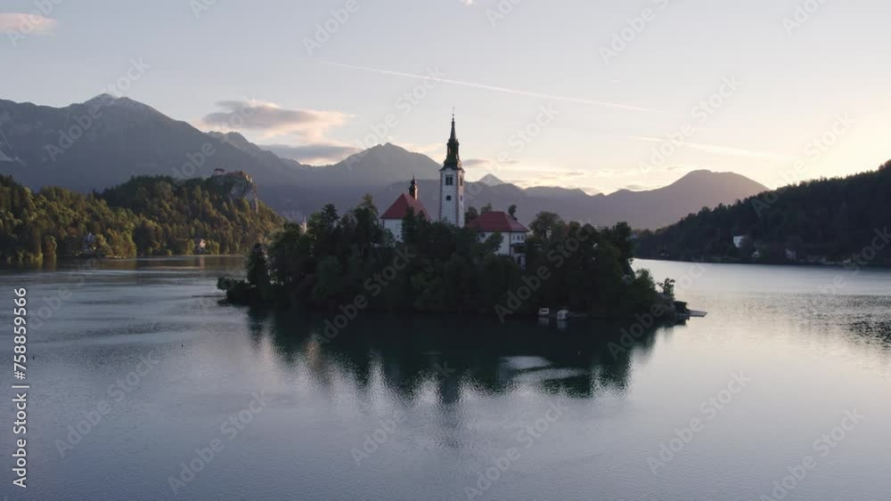 Aerial view of lake bled with church Cerkev Marijinega on island during sunrise, Gorenjska, Slovenia Aerial view of lake bled with church Cerkev Marijinega on island during sunrise, Gorenjska, Slovenia