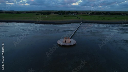 Aerial view of art object (De streken) with Oerol in Waddenzee during sunrise, Terschelling, Netherlands photo