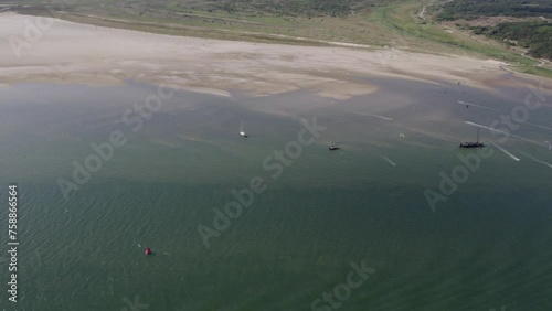 Aerial view of ferry and kitesurfing near Terschelling island, Netherlands