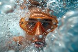 Man Wearing Mask and Goggles Underwater
