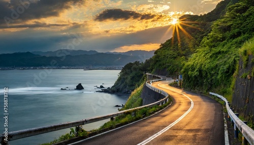 日本の夕焼けの海沿いの公道 photo