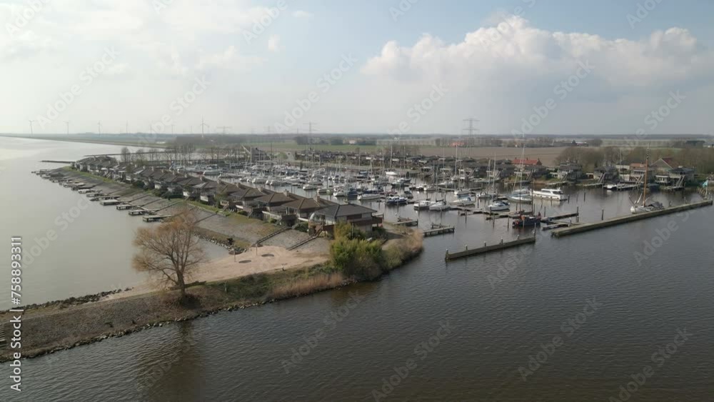 Aerial view of marina with sailboats and houses, Schokkerhaven, Nagele, Netherlands Aerial view of marina with sailboats and houses, Schokkerhaven, Nagele, Netherlands