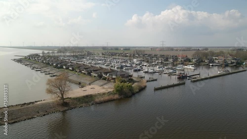 Aerial view of marina with sailboats and houses, Schokkerhaven, Nagele, Netherlands photo