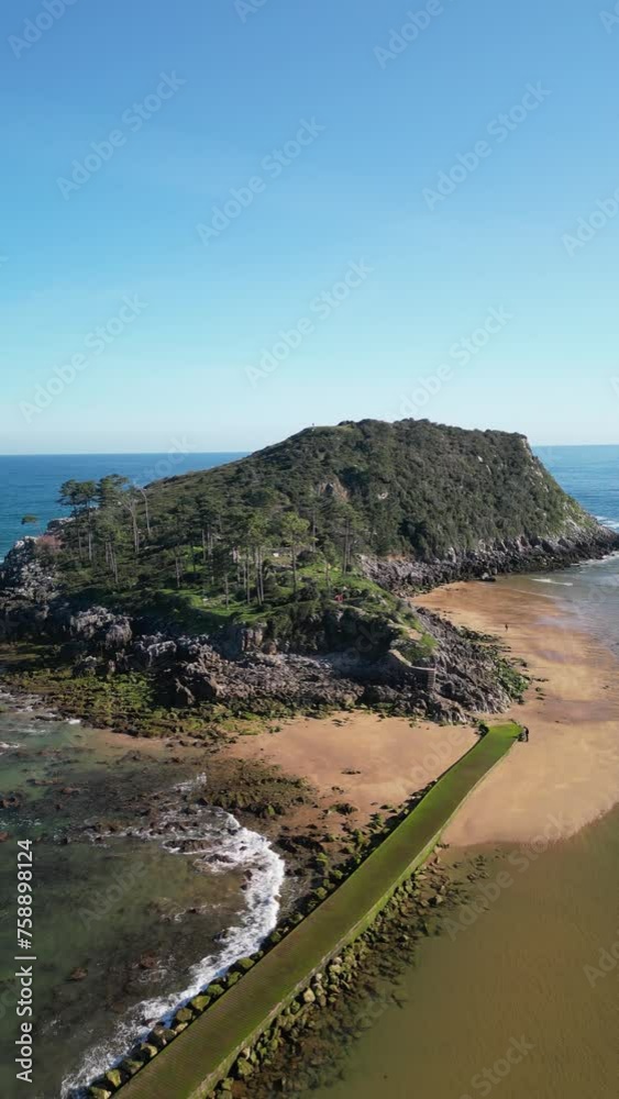 Aerial view of beautiful beach and coastline in Basque Country, Biscay, Isla de San Nicolas, Lekeitio, Spain. Aerial view of beautiful beach and coastline in Basque Country, Biscay, Isla de San Nicolas, Lekeitio, Spain.