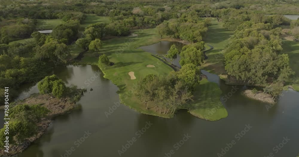Aerial view of Constance Golf Course with stunning water hazards and greenery, Pointe de Flacq, Mauritius.