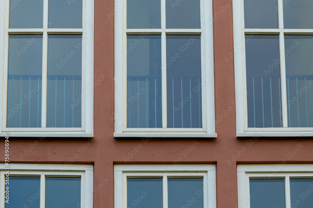 building has many windows and the view from the top is of the city building has many windows and the view from the top is of the city