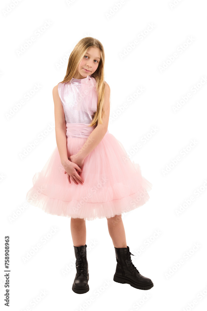 Young girl posing in elegant pink dress