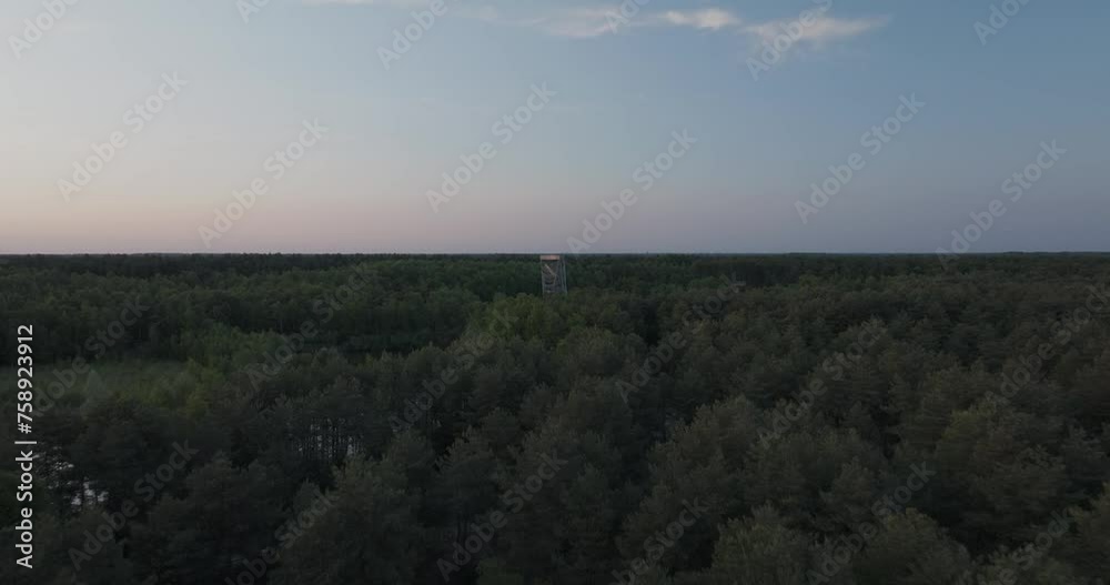 Aerial view of the beautiful nature reserve Sahara Lommel with serene sunset over the tranquil pond, Lommel, Belgium. Aerial view of the beautiful nature reserve Sahara Lommel with serene sunset over the tranquil pond, Lommel, Belgium.