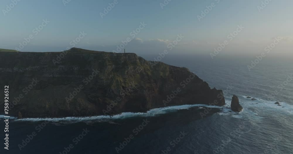 Aerial view of the beautiful Azores with Farol dos Rosais lighthouse on the remote Sao Jorge Island, Portugal. Aerial view of the beautiful Azores with Farol dos Rosais lighthouse on the remote Sao Jorge Island, Portugal.