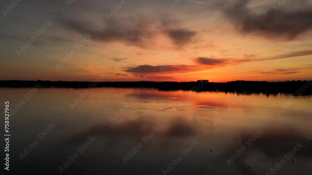 Aerial view of sunset over lake Worthsee in Bavaria, Germany. Aerial view of sunset over lake Worthsee in Bavaria, Germany.