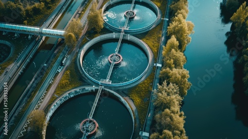 Aerial view of a waterway with industrial water tanks, suitable for industrial and environmental concepts