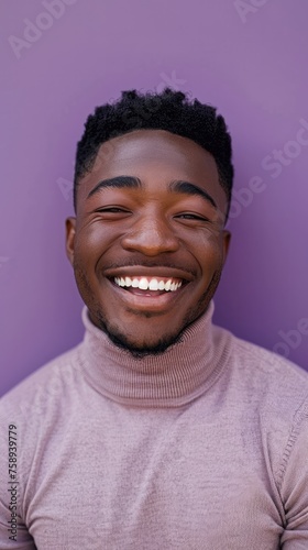Portrait of a happy black man on colored background