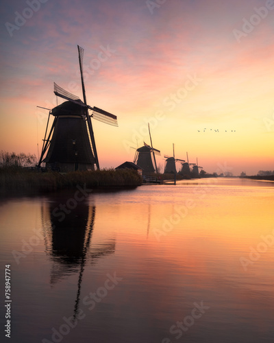 Orange sunrise over Kinderdijk Mills