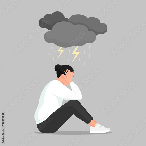 Depressed woman with clouds above her