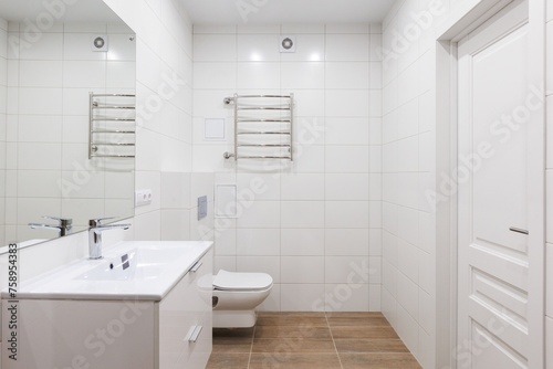 modern bathroom room with toilet and washing machine