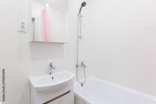 modern bathroom room with toilet and washing machine