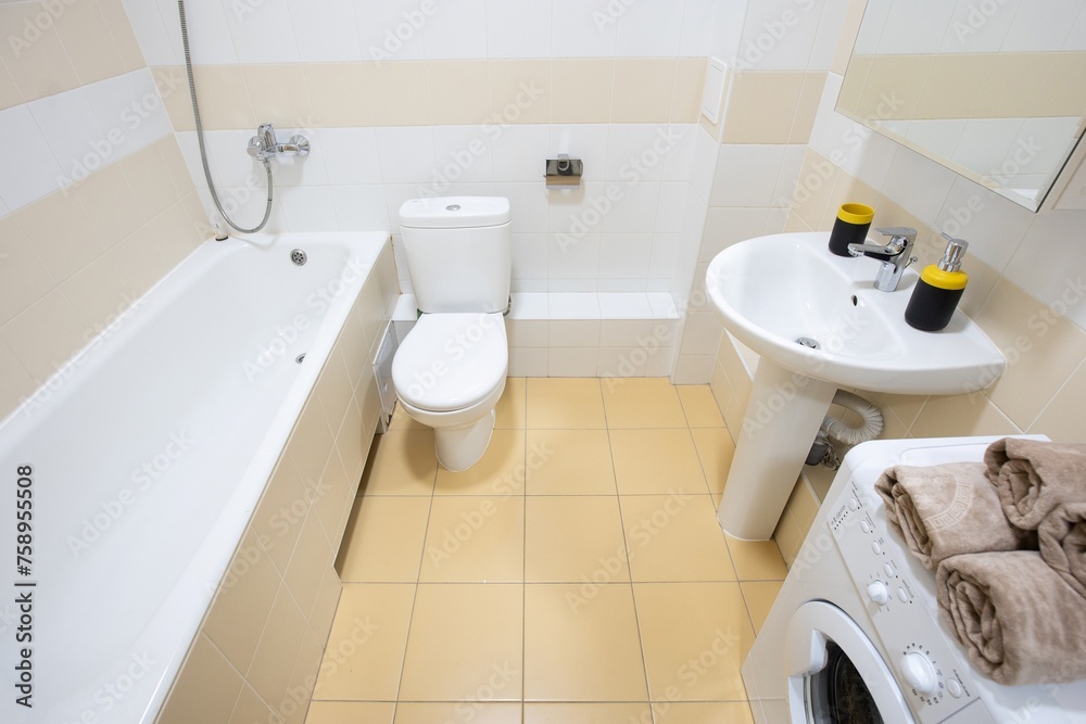 Fototapeta premium modern bathroom room with toilet and washing machine
