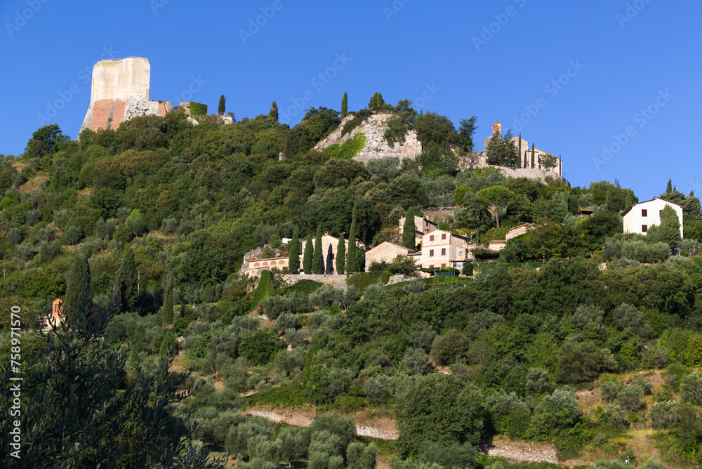 Fototapeta premium The Tentennano fortress dominates the town of Castiglione D'Orcia, Italy