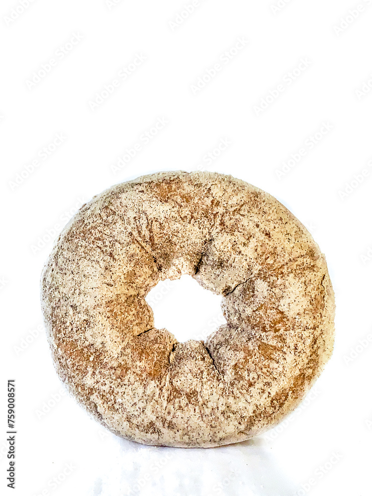 Cinnamon and sugar coated cake donut on a white background Cinnamon and sugar coated cake donut on a white background