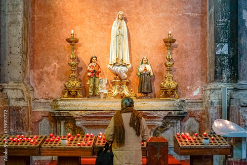  religious figures of saints of the catholic church, our lady of Fatima, santo Francisco Marto, santa Jacinta Marto, whith prayer.lisbon 