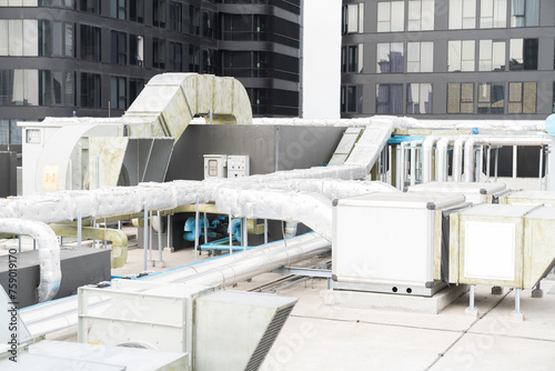 Pipes cooling AHU for ventilation, Air conditioning. Pipes of HVAC air conditioning network system on building rooftop