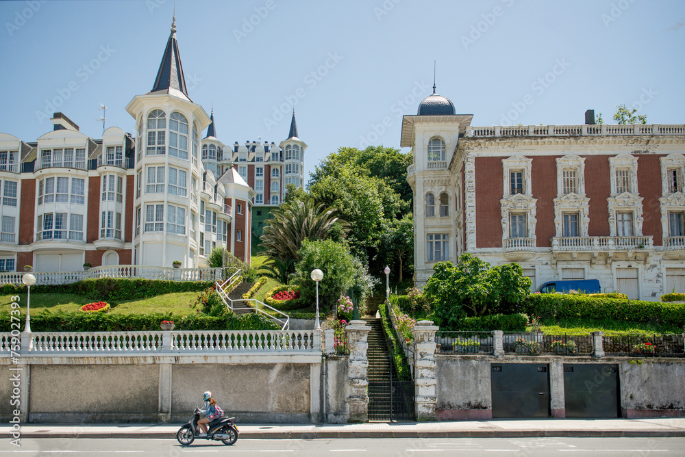 Naklejka premium Urban architecture in San Sebastian, Spain. View from the promenade along the coastline in San Sebastian.