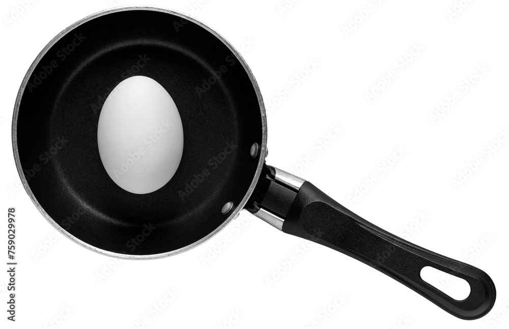 A small frying pan with a white egg inside A small frying pan with a white egg inside