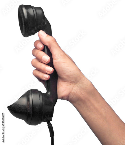 A right hand holding an old telephone