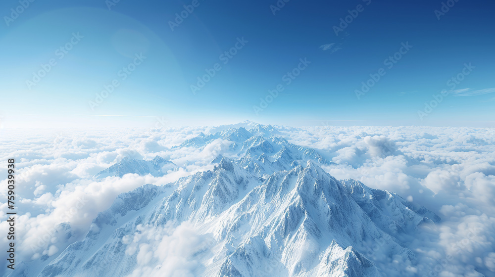 A breathtaking view of snow-clad mountain peaks soaring above a vast cloud cover under a clear blue sky