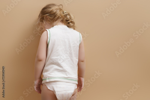 Canvas Print A sad girl with back to the camera