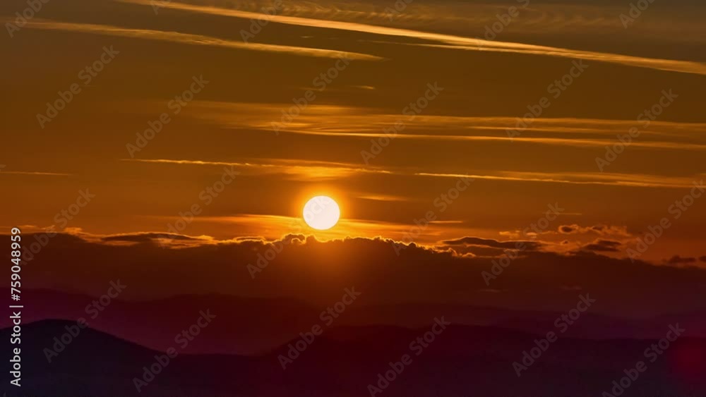 Nature sunset landscape cumulus clouds rolling over hills and mountains time-lapse