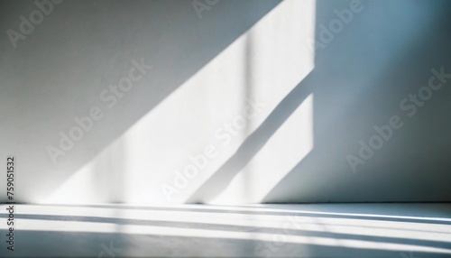 abstract white studio background for product presentation wall with shadows of window display product with blurred backdrop