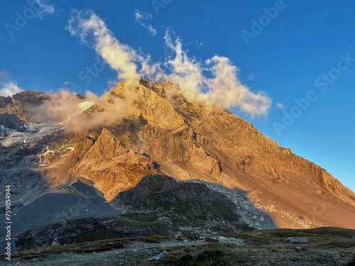 Golden Peaks Horizon: Sunrise Bliss in Vanoise National Park, Hautes Alps, France photo