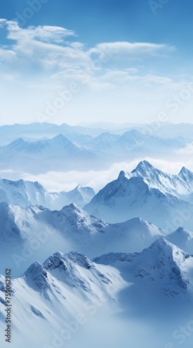 a snowy mountain tops with clouds in the background © Maria