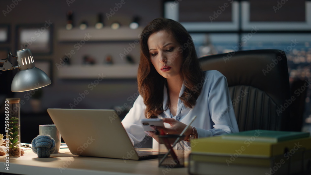 Busy businesswoman answering call at laptop table. Happy lady phone conversation Busy businesswoman answering call at laptop table. Happy lady phone conversation