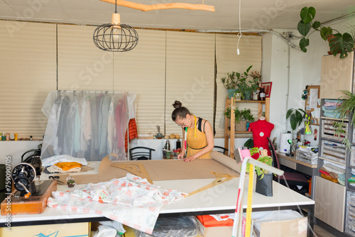 seamstress works in a beautiful workshop photo