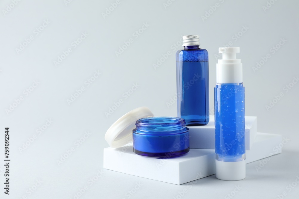 Set of luxury cosmetic products on white background. Space for text